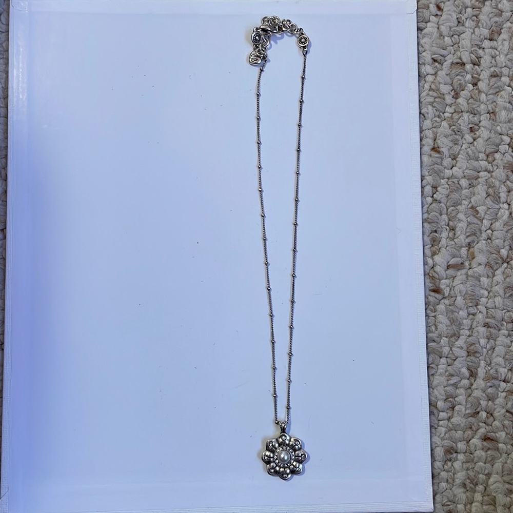 Silver follower necklace